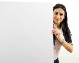 Woman holding a sign